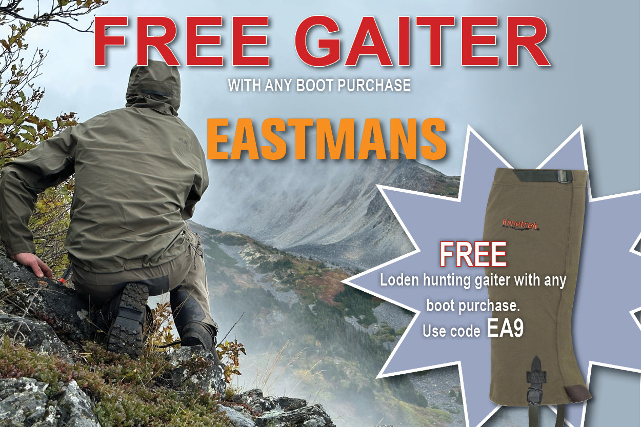 Promotional graphic for an Eastmans free gaiter offer, featuring a man in an olive green hooded gaiter standing in a mountain landscape, alongside a product inset of the tan gaiter and large text reading 'FREE GAITER' and 'EASTMANS'.